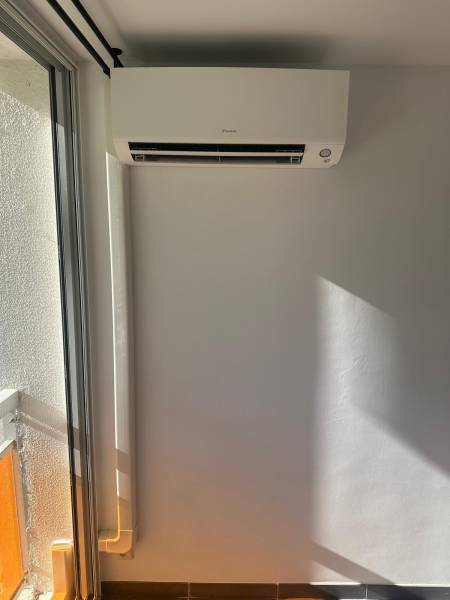 Climatisation dans un ancien logement à Alès : Conseils CDE